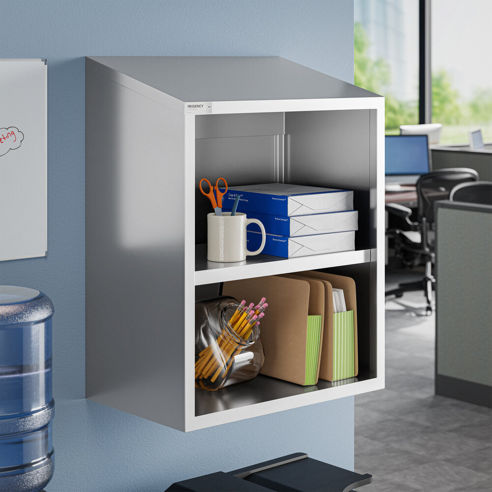 A stainless steel open wall cabinet with two shelves, used for office storage.