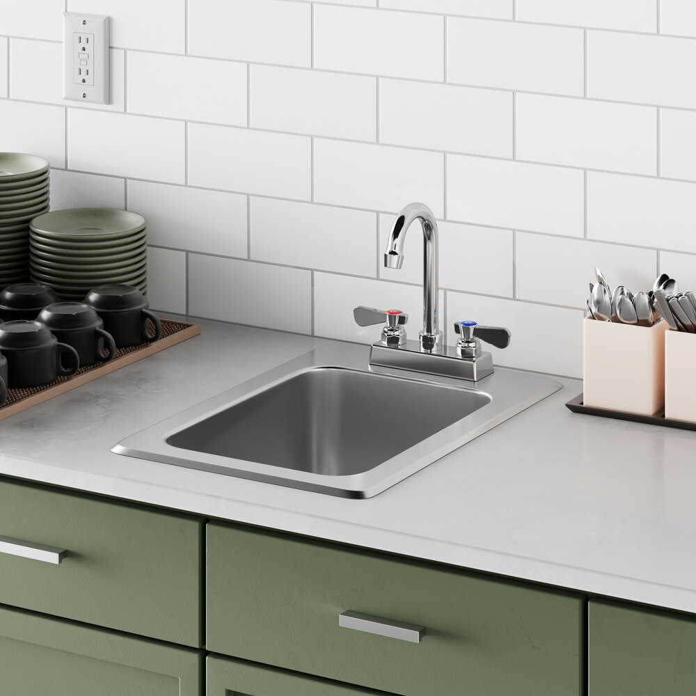 A close up of a Regency stainless steel drop-in sink.