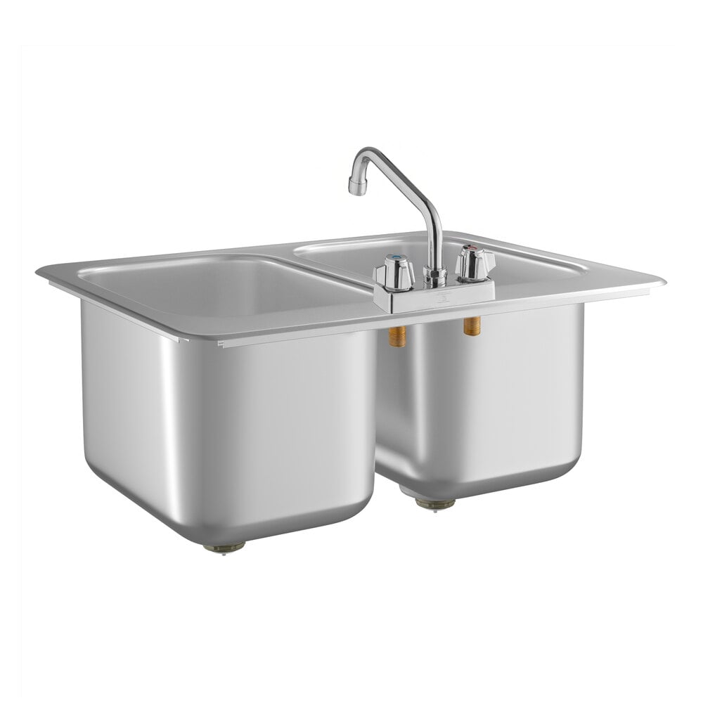 A Regency stainless steel double sink with faucet.