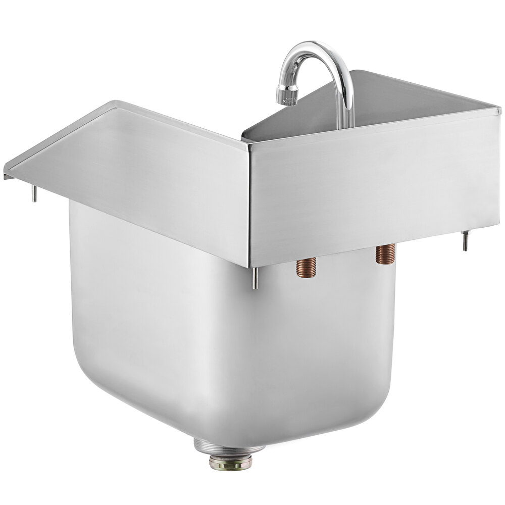 a stainless steel sink with a faucet