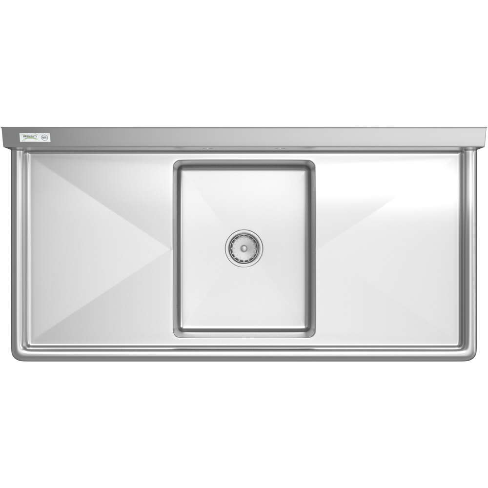 A Regency stainless steel commercial sink with 2 drainboards and a bowl with a circular hole in front of it.