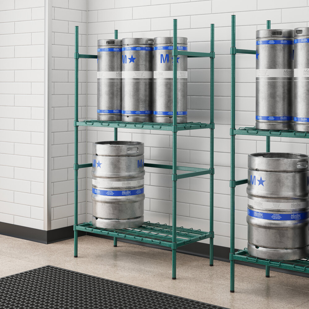 A Regency metal rack with green epoxy shelves holding kegs.