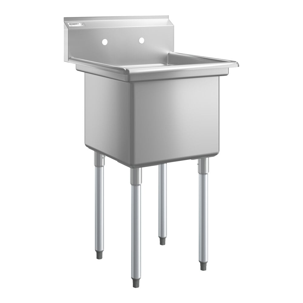 A stainless steel single-compartment sink with four metal legs and a backsplash featuring two faucet holes.