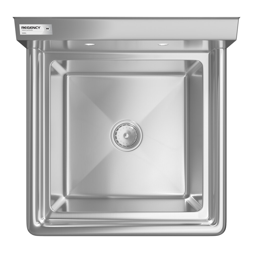 A top-down view of a square stainless steel sink with a central drain and a backsplash featuring two faucet holes.