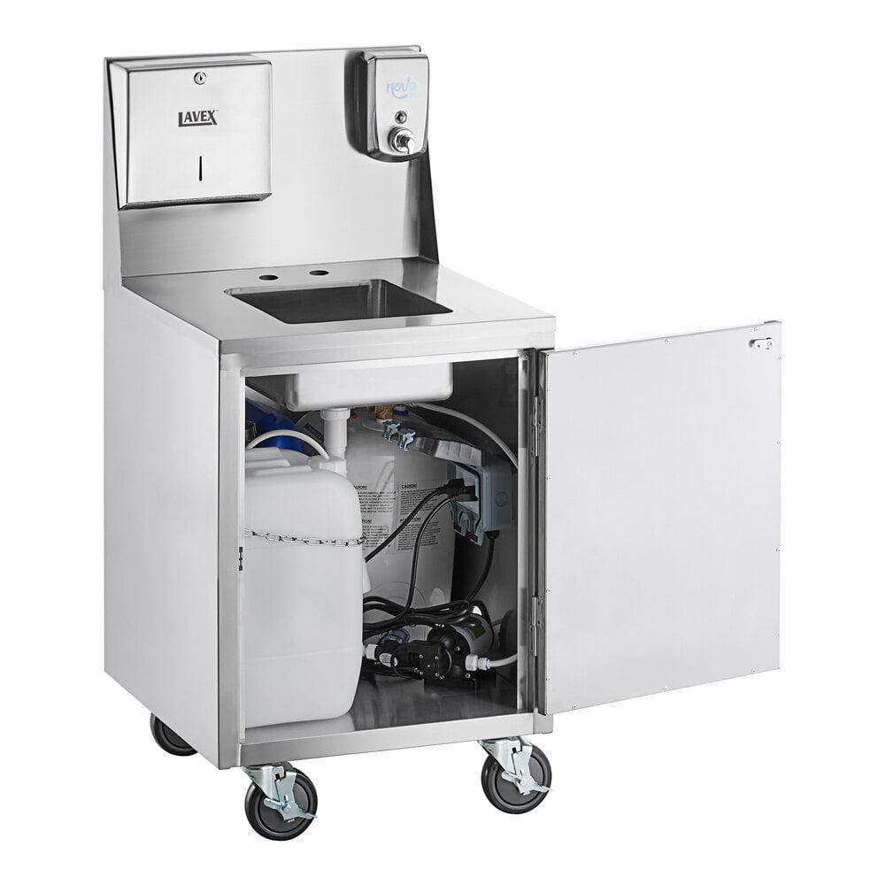 A stainless steel portable hand sink cart with a single bowl, paper towel dispenser, soap dispenser, and an open cabinet door revealing water tanks and plumbing components inside.