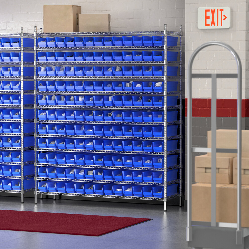 A storage room with Regency wire shelving and blue bins.