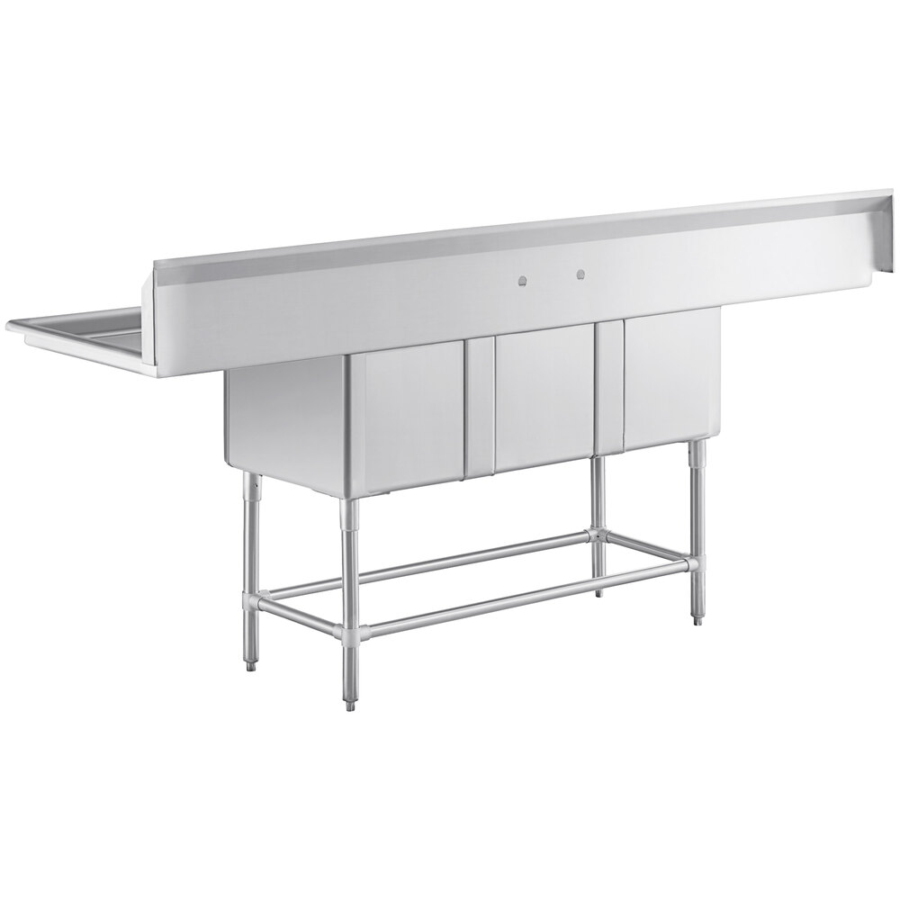 A Regency stainless steel three compartment sink with two drainboards.