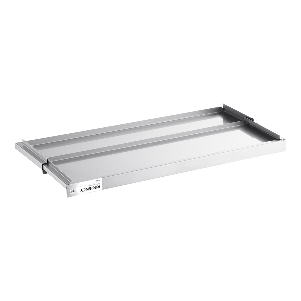 A rectangular stainless steel sliding lid with raised edges and a handle on one side.
