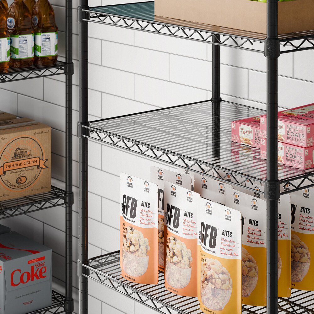 A clear PVC shelf liner placed on a wire shelving unit.