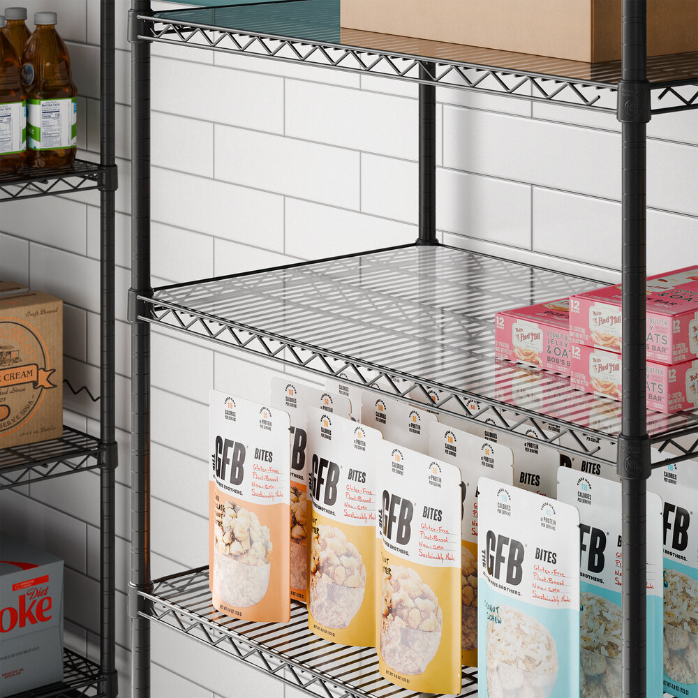 A clear PVC shelf liner placed on a wire shelving unit.