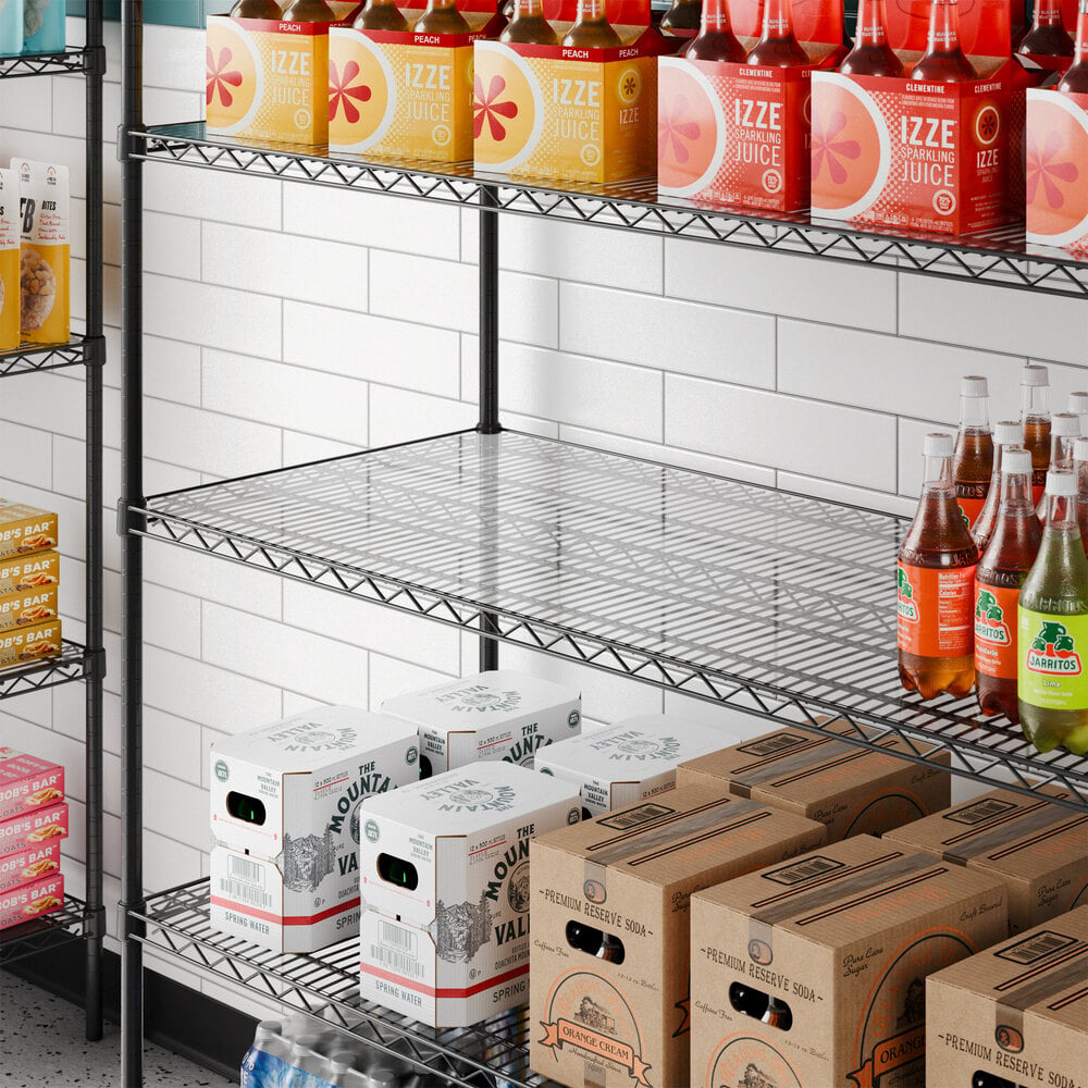 A clear PVC shelf liner placed on a metal wire shelving unit.