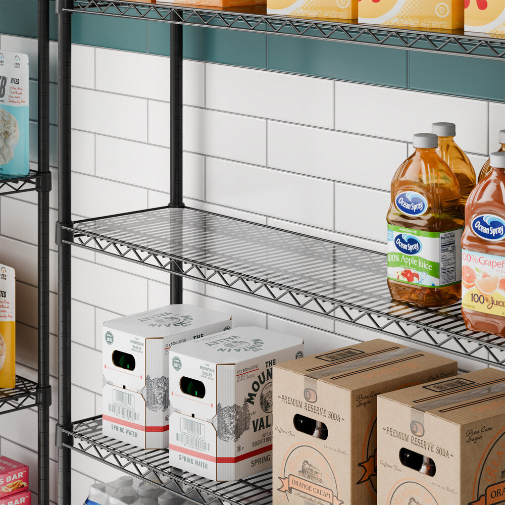 A clear PVC shelf liner placed on a wire shelving unit.
