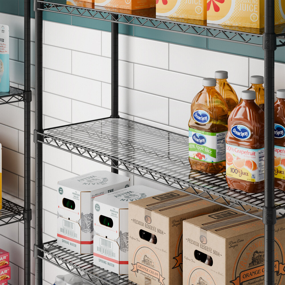 A clear PVC shelf liner placed on a metal wire shelving unit.