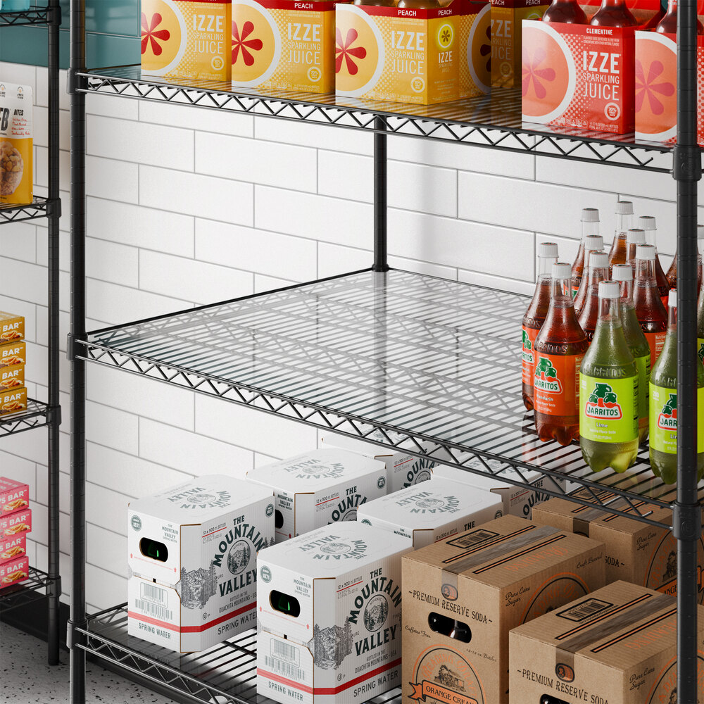 A clear PVC shelf liner placed on a wire shelving unit.
