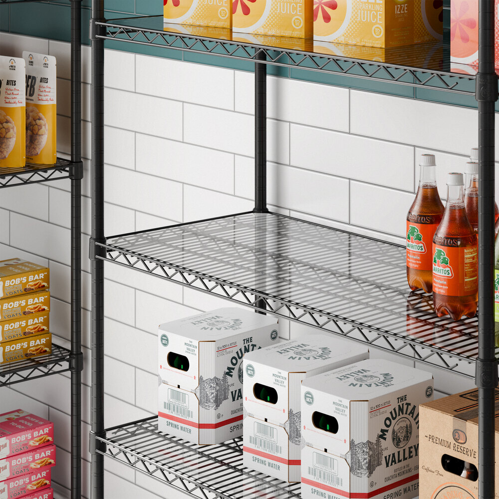 A clear PVC shelf liner placed on a wire shelving unit.