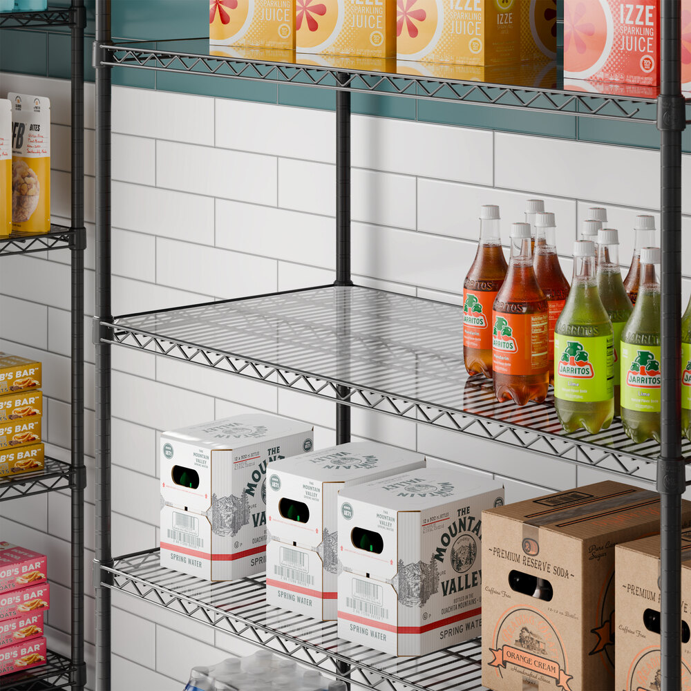 A clear PVC shelf liner placed on a metal wire shelving unit.