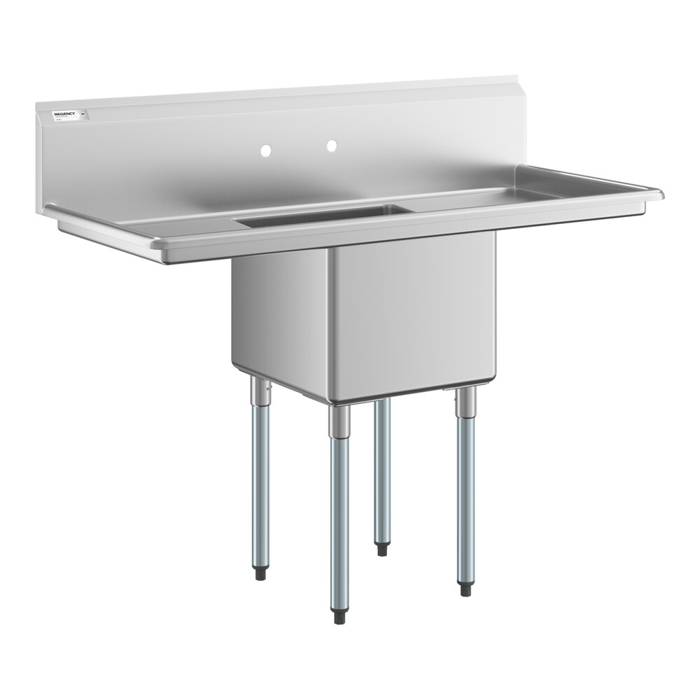 A stainless steel commercial sink with one deep basin, two side drainboards, a backsplash, and four metal legs.
