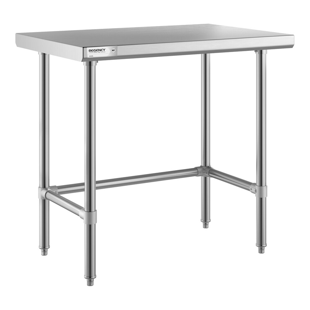 A stainless steel table with an open base and four legs, featuring crossbars for added stability.