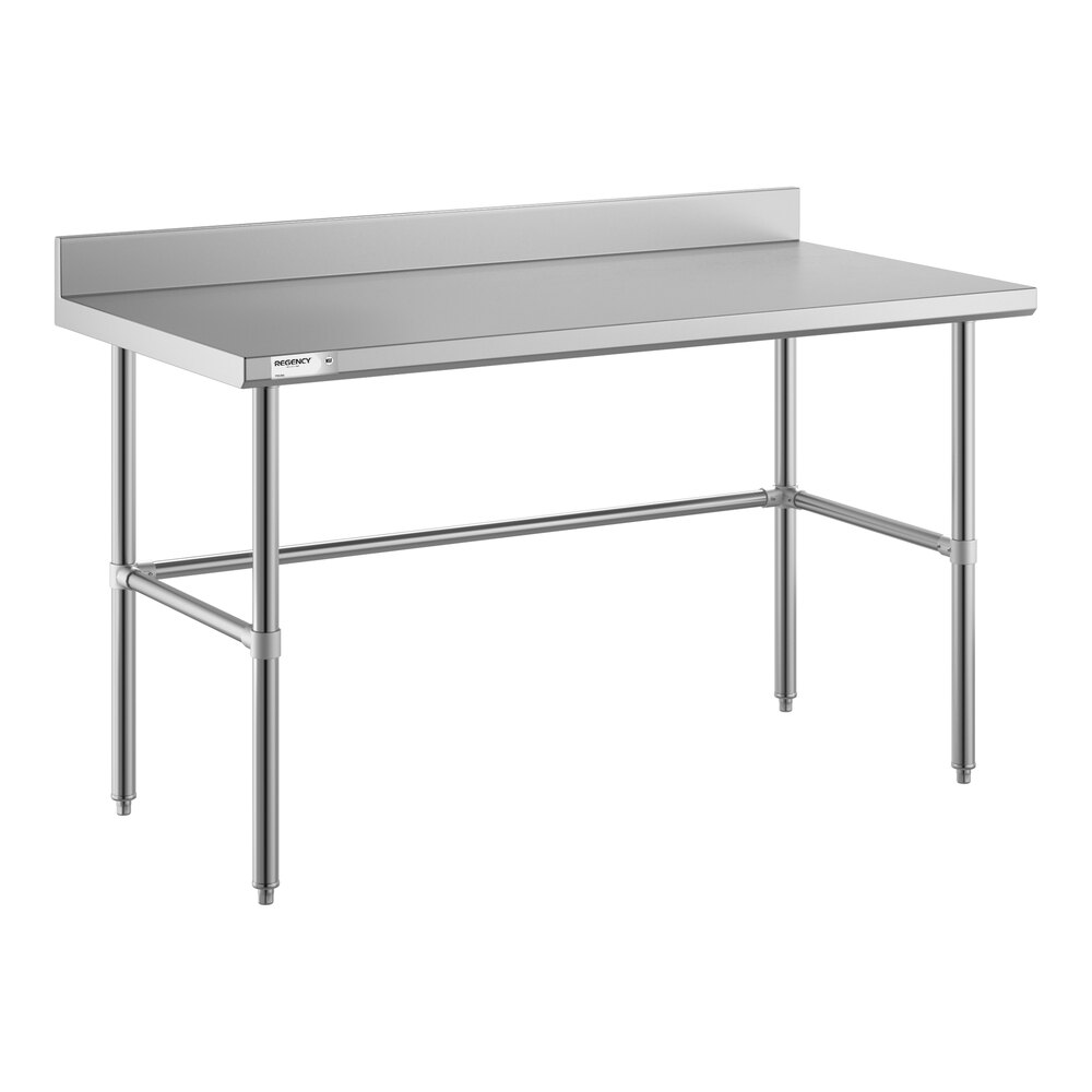 A stainless steel work table with an open base, four legs, and a 4-inch backsplash along the back edge.