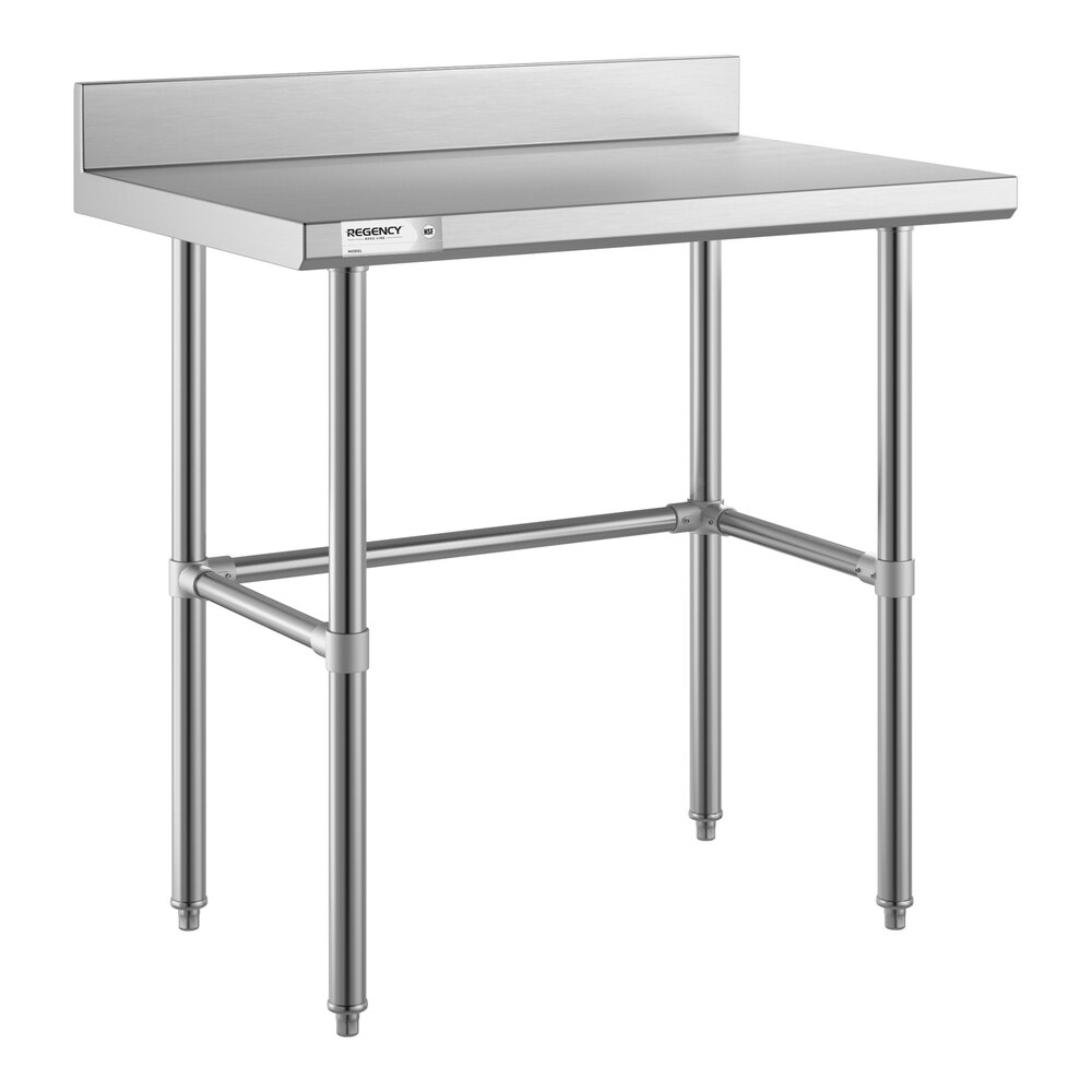 A stainless steel work table with an open base, four legs, and a 4-inch backsplash along the back edge.
