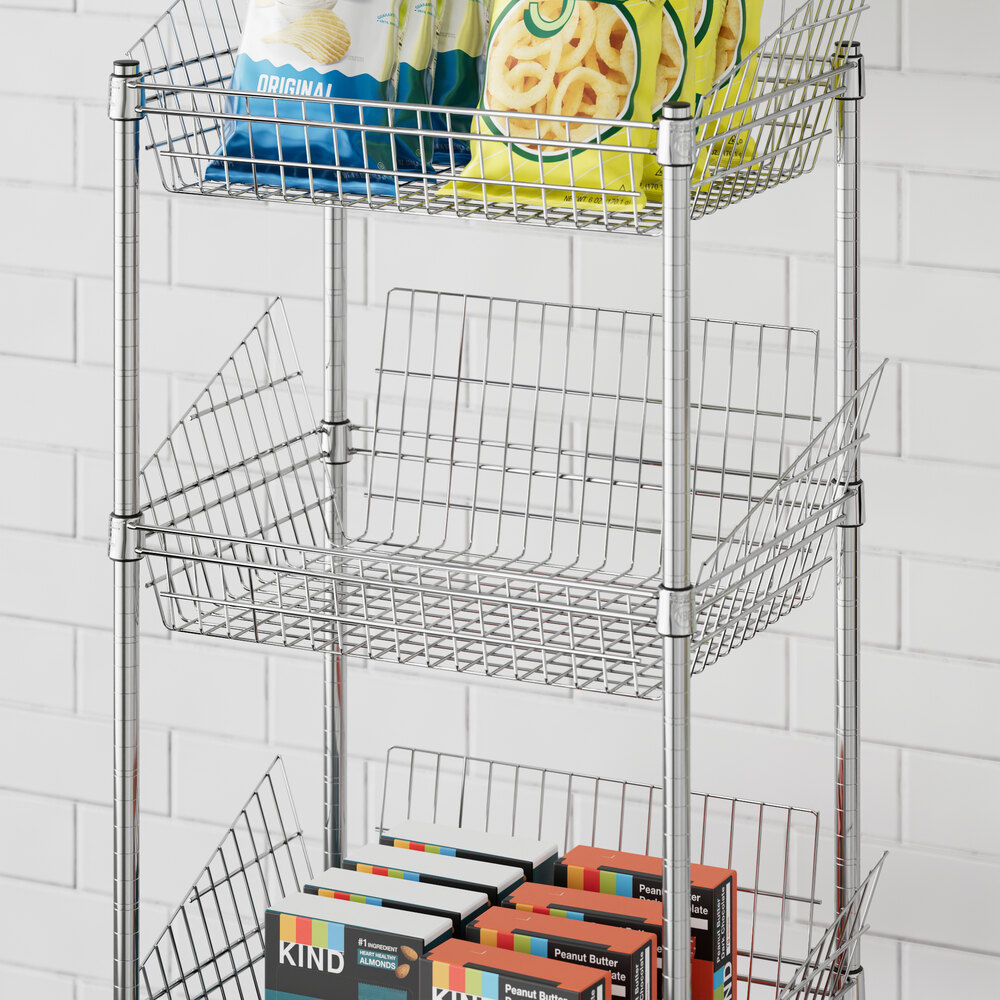 A metal Regency display shelf with food in baskets.