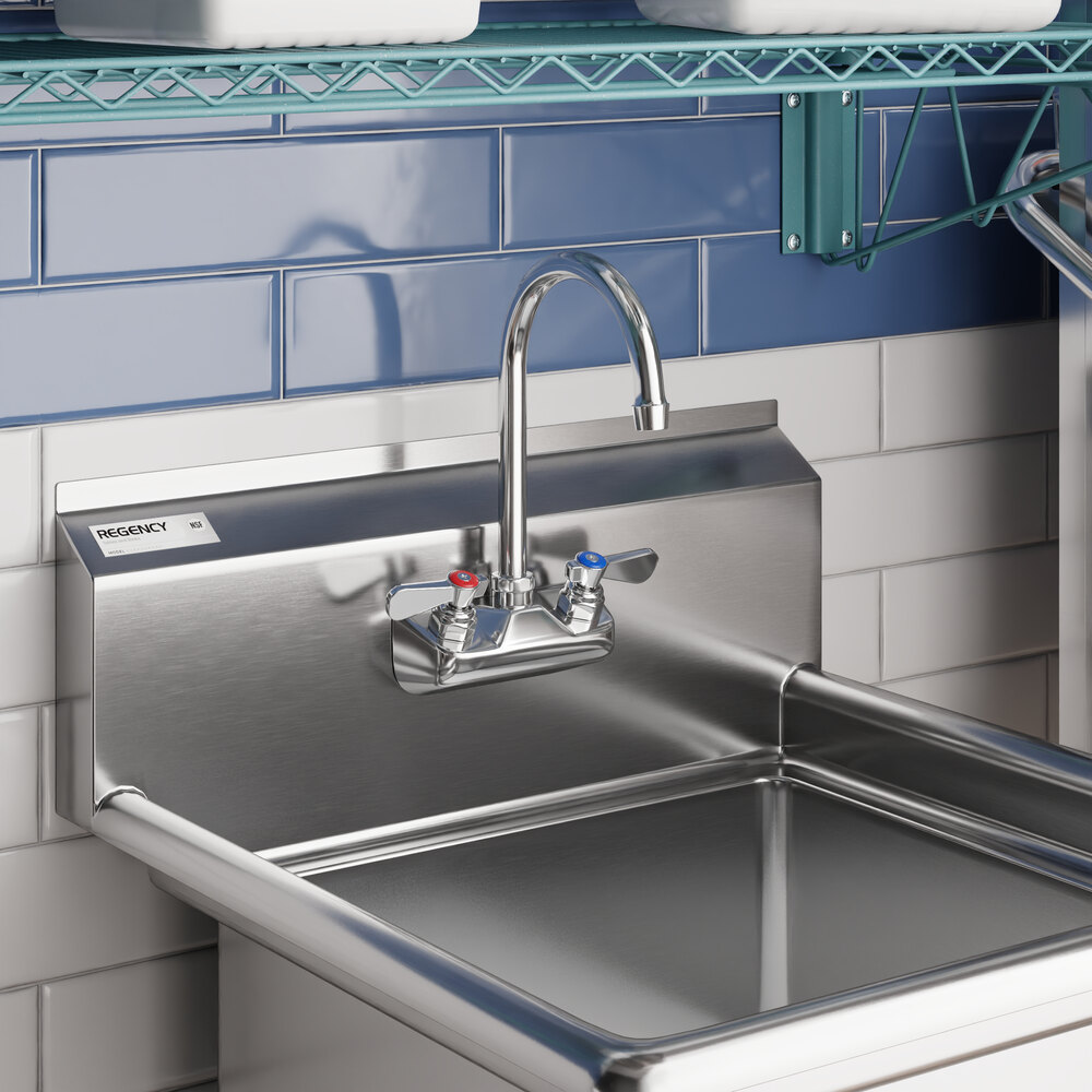 A stainless steel wall mount sink faucet with a 6-inch swivel gooseneck spout and dual handles for hot and cold water.