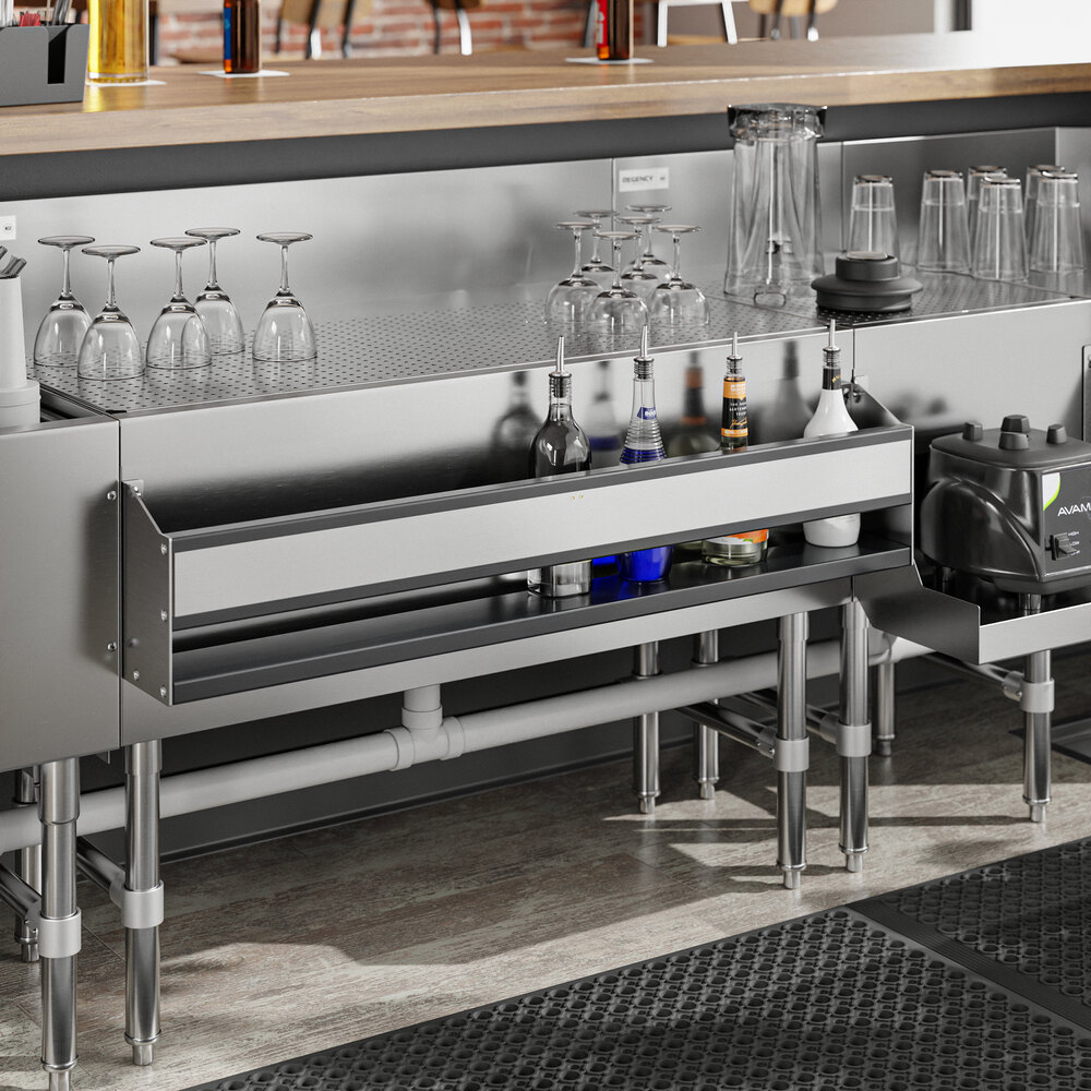 A stainless steel Regency speed rail on a counter in a cocktail bar.