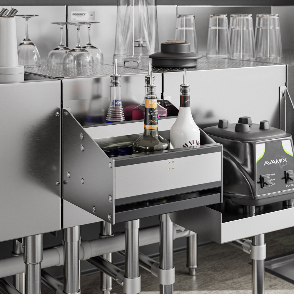 A stainless steel double-tier speed rail mounted under a countertop, holding several bottles of liquor and mixers.