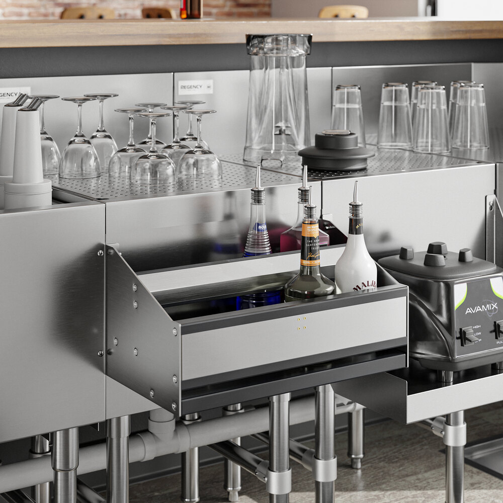A Regency stainless steel double tier speed rail on a bar with several glasses and bottles.