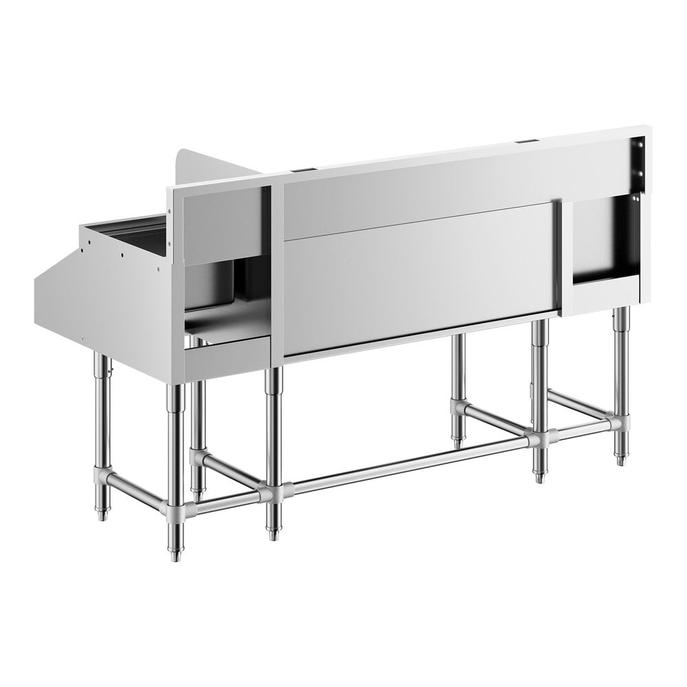 A stainless steel workstation with multiple compartments, a drainboard, and sturdy metal legs.