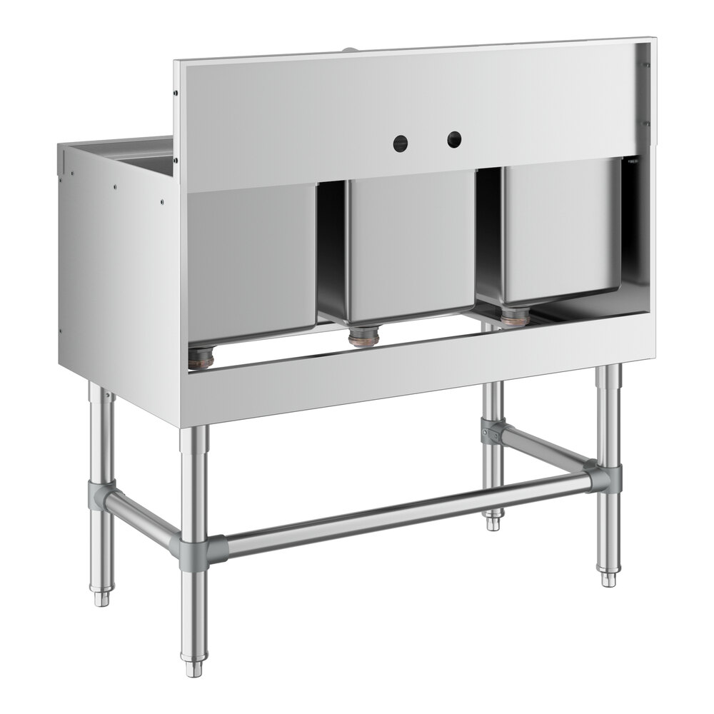 A Regency stainless steel underbar sink with three bins.