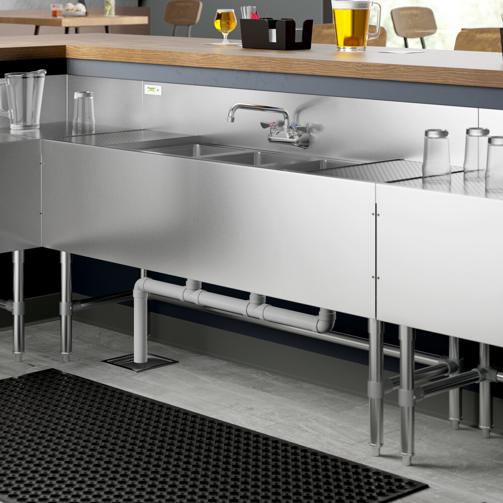 A Regency stainless steel underbar sink with (2) 12" drainboards.