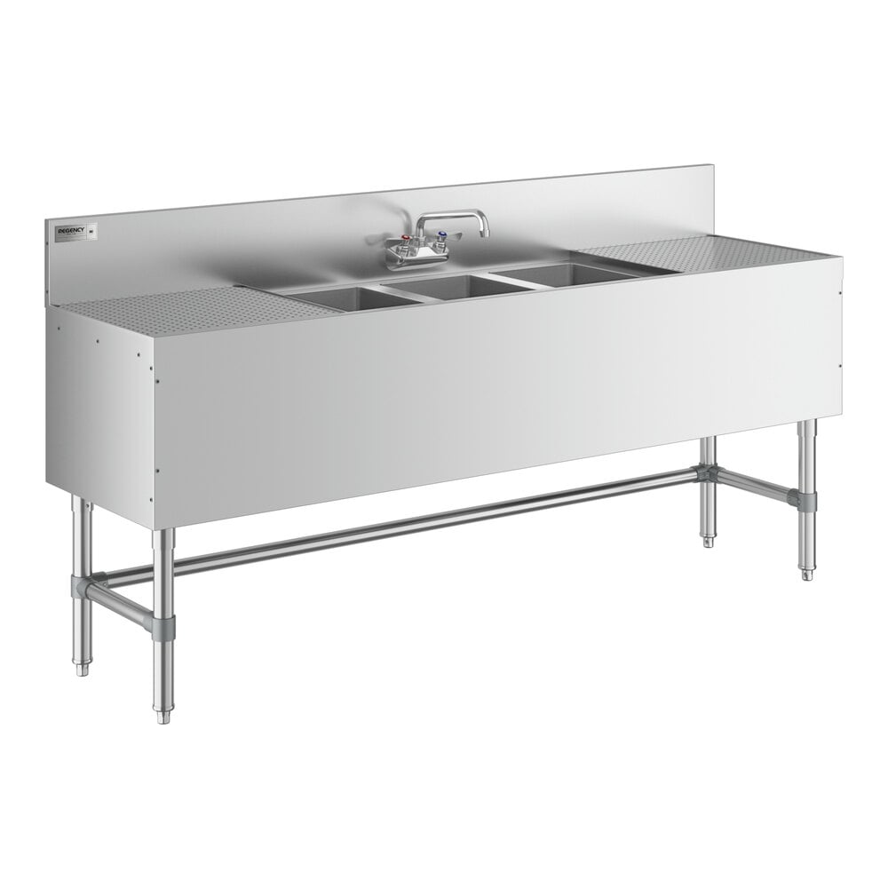 A Regency stainless steel underbar sink with three bowls, (2) 18" drainboards, and a faucet.