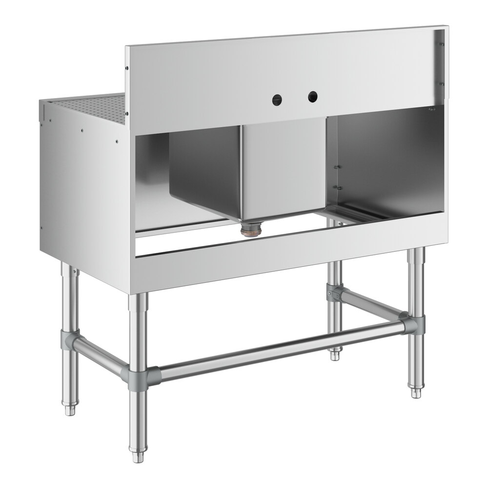 A Regency stainless steel underbar sink with (2) drainboards and faucet.