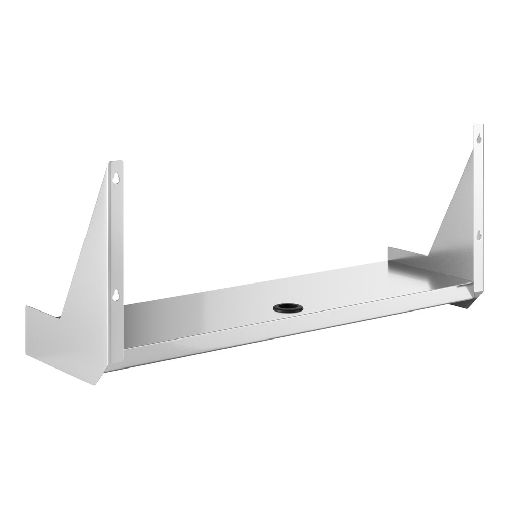 A stainless steel metal shelf with a hole in the middle.