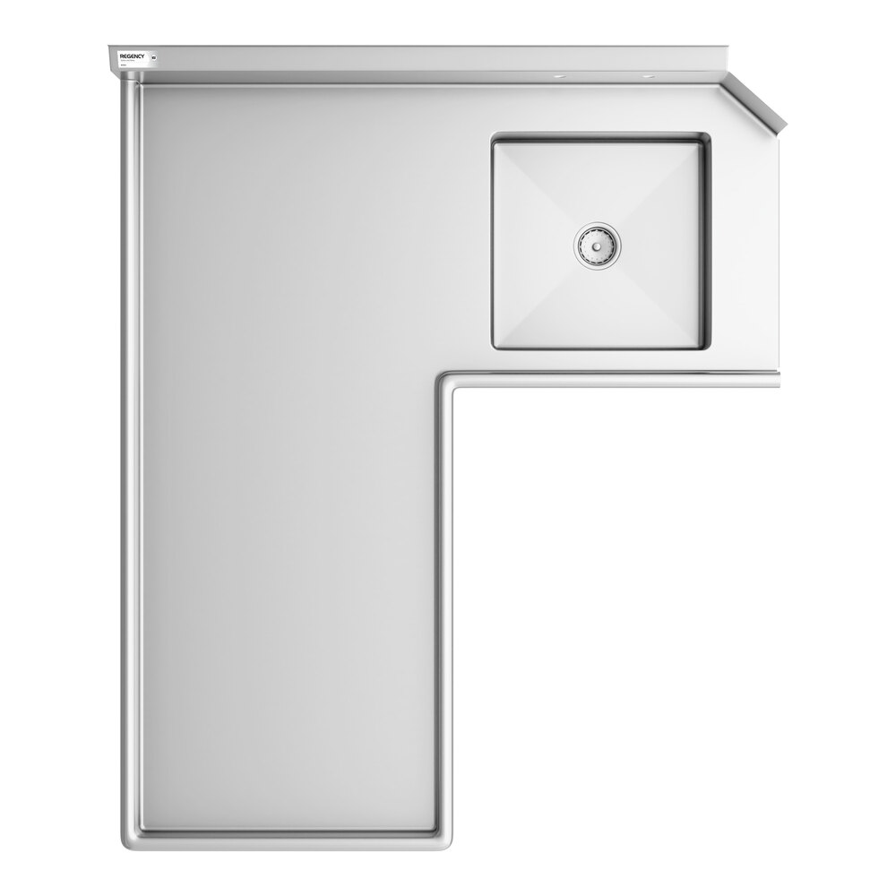A top-down view of an L-shaped stainless steel dishtable with an integrated square sink on the right side.