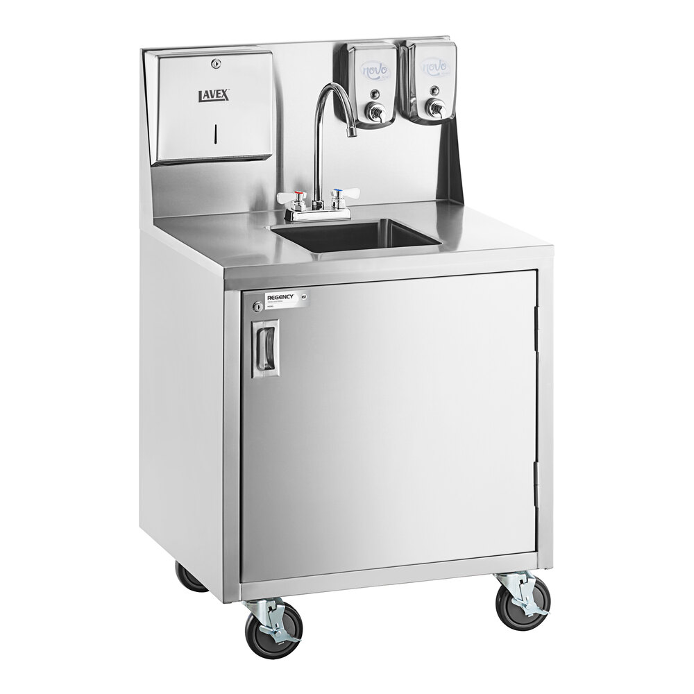 A stainless steel portable hand sink cart with a single bowl, gooseneck faucet, paper towel dispenser, soap dispensers, and a cabinet on wheels.