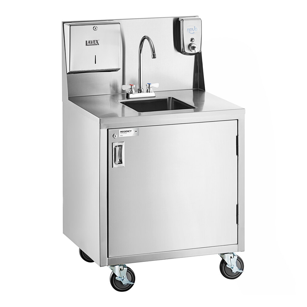 A stainless steel portable hand sink cart with a single bowl, gooseneck faucet, paper towel dispenser, soap dispenser, and a cabinet below, mounted on four caster wheels.