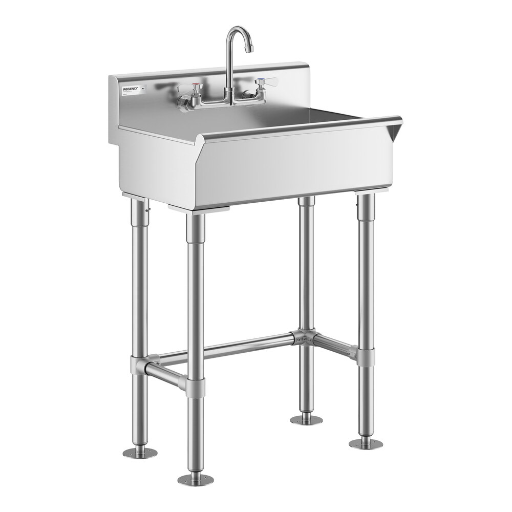 A stainless steel hand sink with four sturdy legs, a high backsplash, and a central faucet with two handles.
