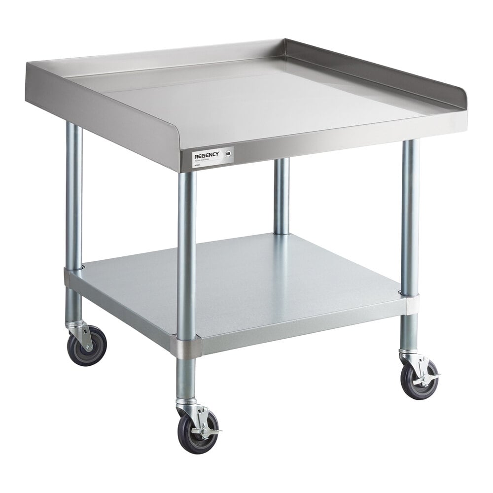 A stainless steel equipment stand with a raised edge, an undershelf, and four caster wheels.