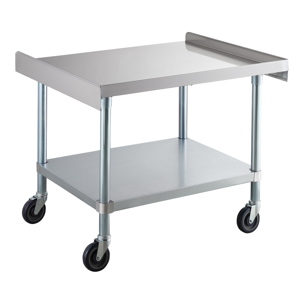 A stainless steel equipment stand with a raised back edge, an undershelf, and four caster wheels.