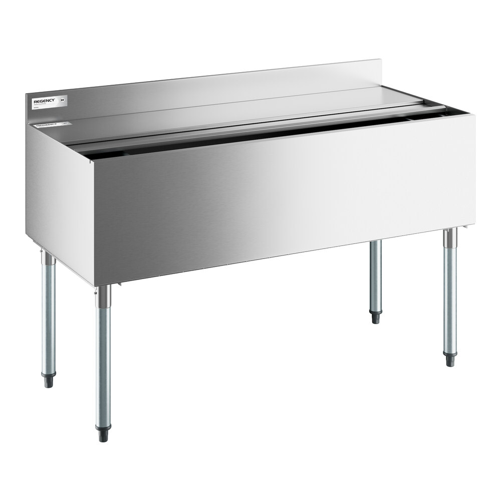 A stainless steel rectangular ice bin with four legs, a sliding lid, and a backsplash.