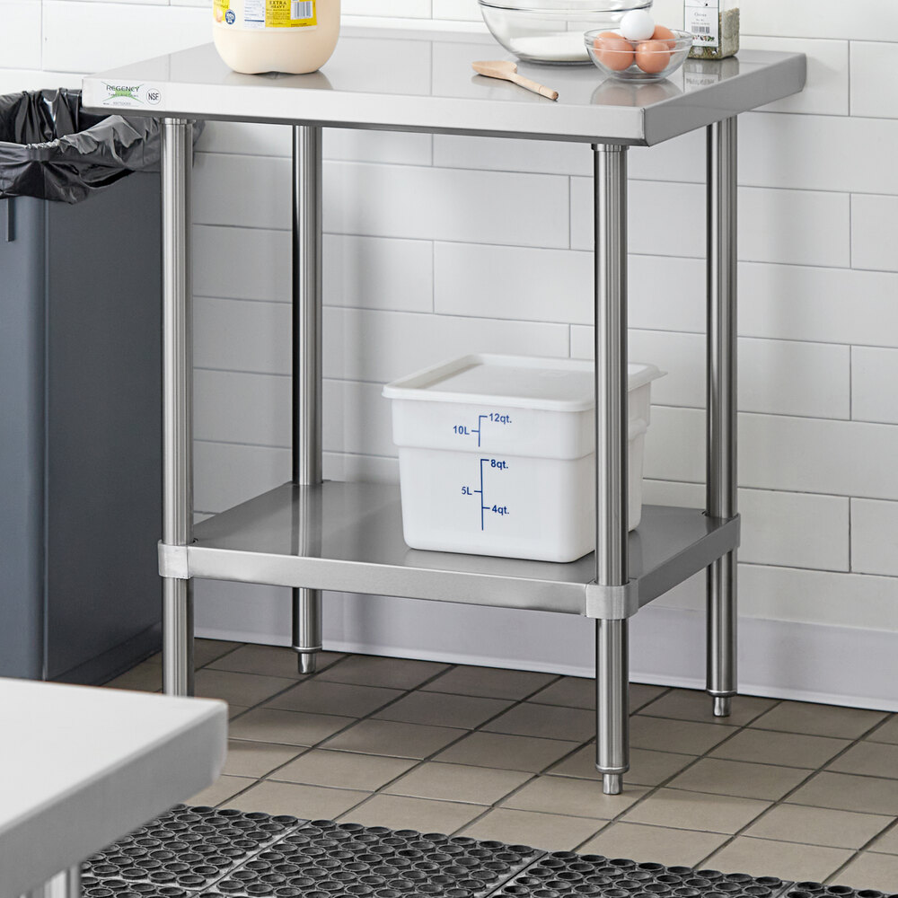 An adjustable stainless steel undershelf designed for 24-inch by 30-inch work tables.