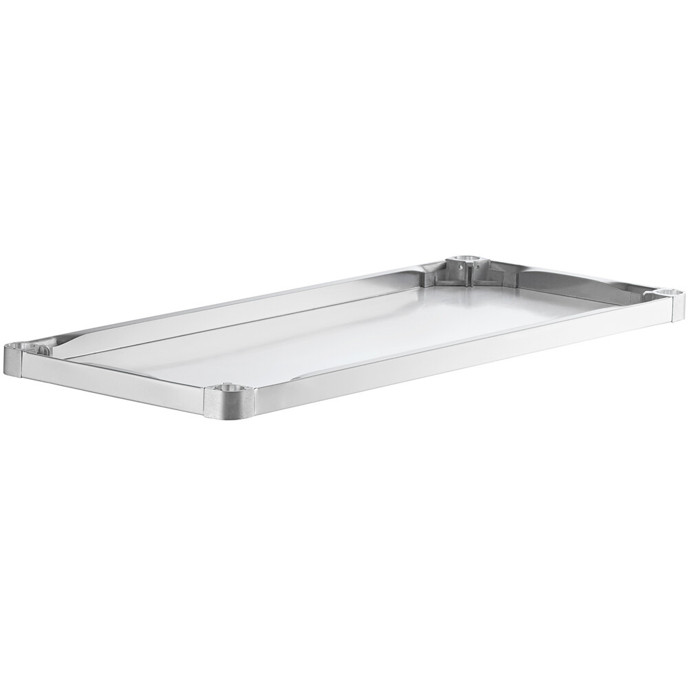 A rectangular stainless steel adjustable undershelf designed for 24" x 48" work tables.