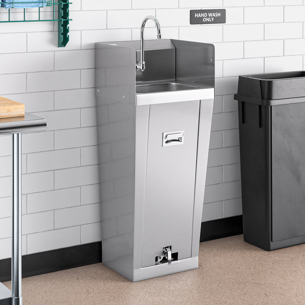 A white rectangular Regency hand sink with a pedestal base next to a stainless steel trash can.