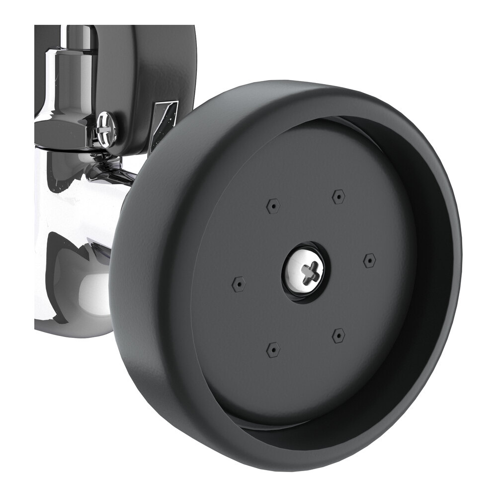 A close-up view of a black wheel attached to a wall-mounted pre-rinse faucet.