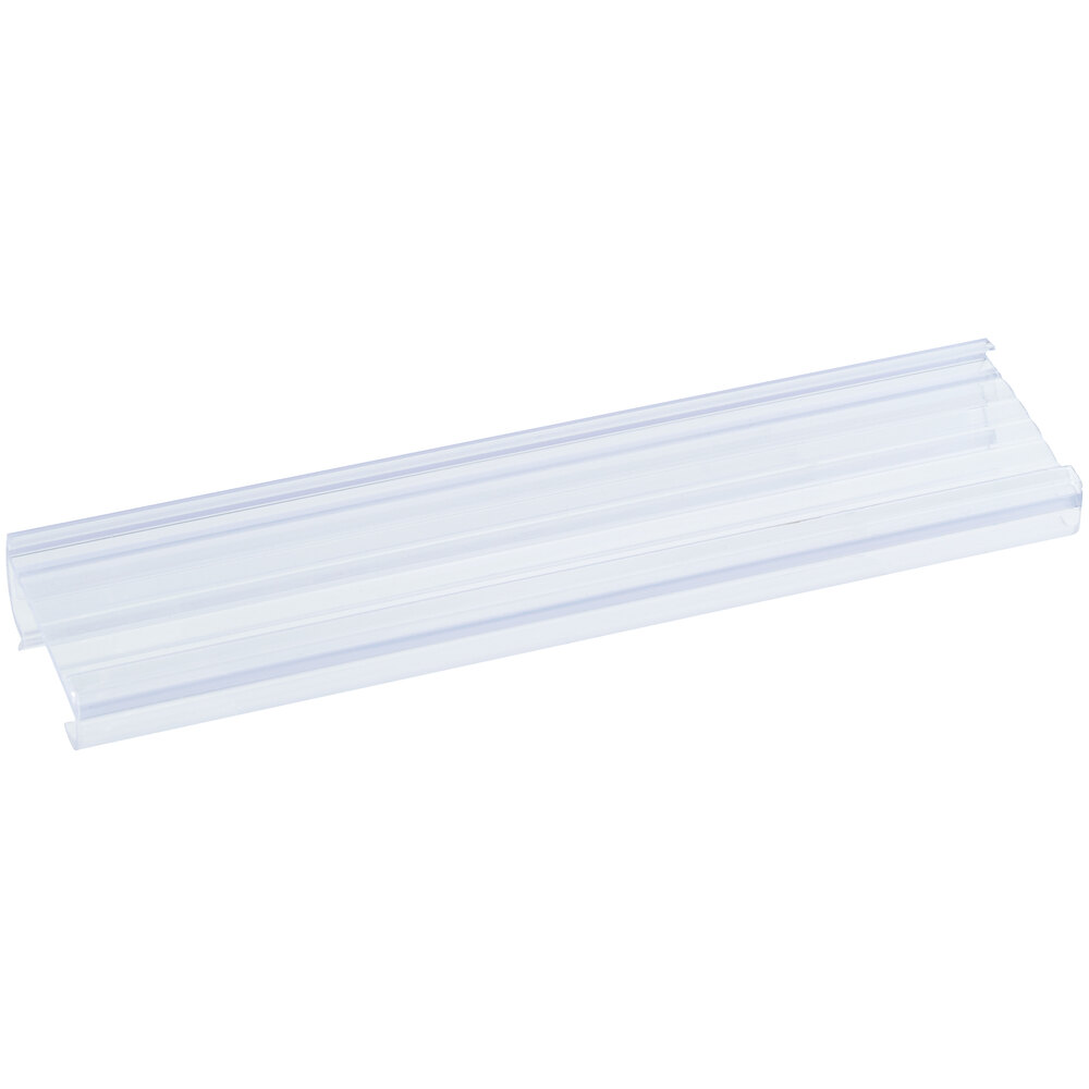 A clear plastic label holder designed for wire shelving, measuring 6 inches by 1 1/4 inches.