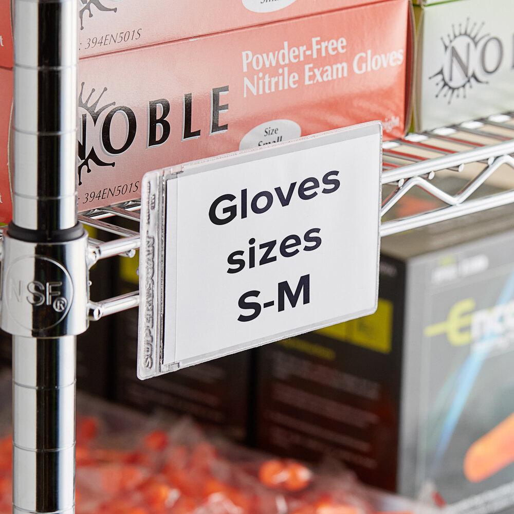 A clear magnetic label holder attached to a metal shelf, displaying a sign for glove sizes S-M.