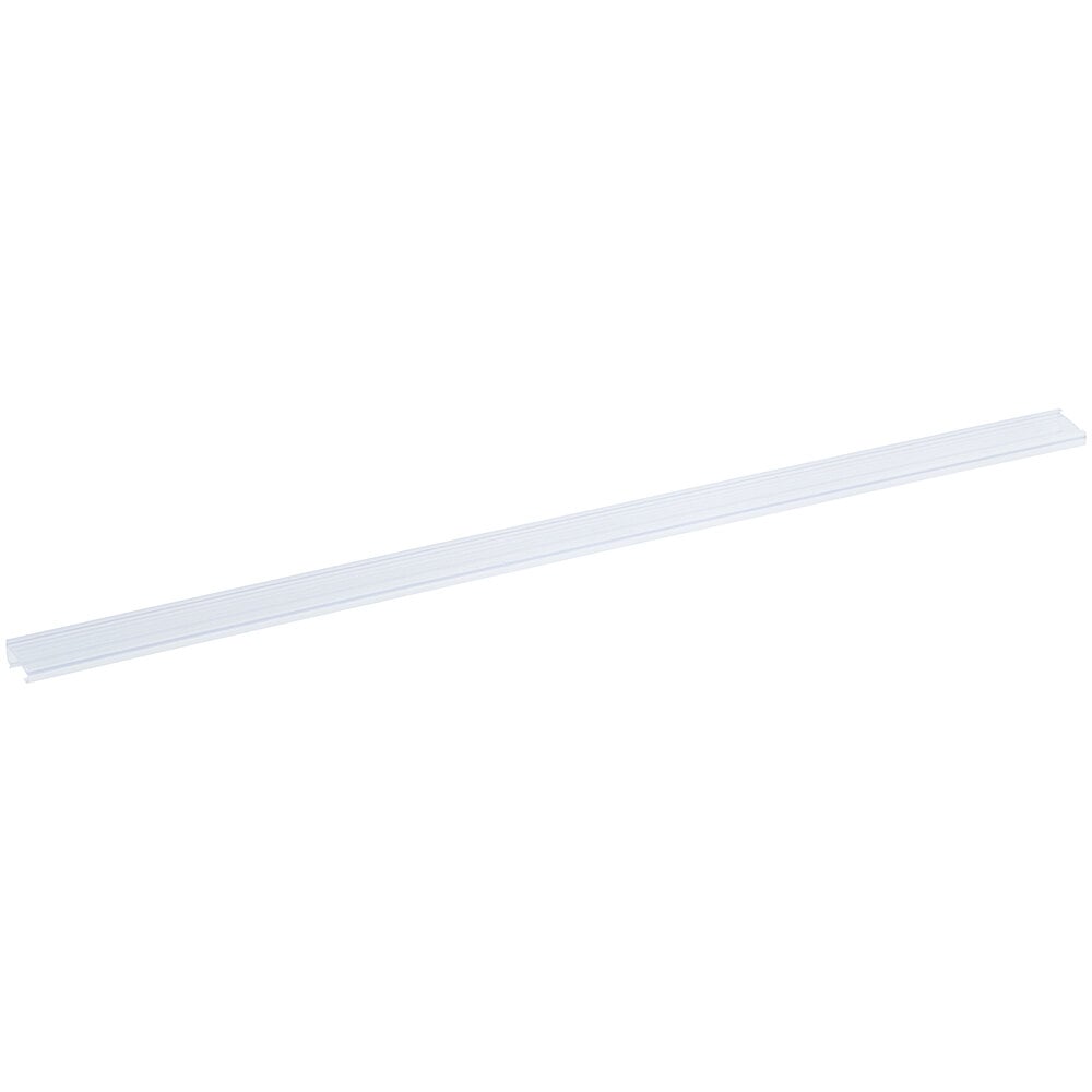 A long, narrow, clear plastic strip with a slightly raised edge, likely used for labeling purposes.