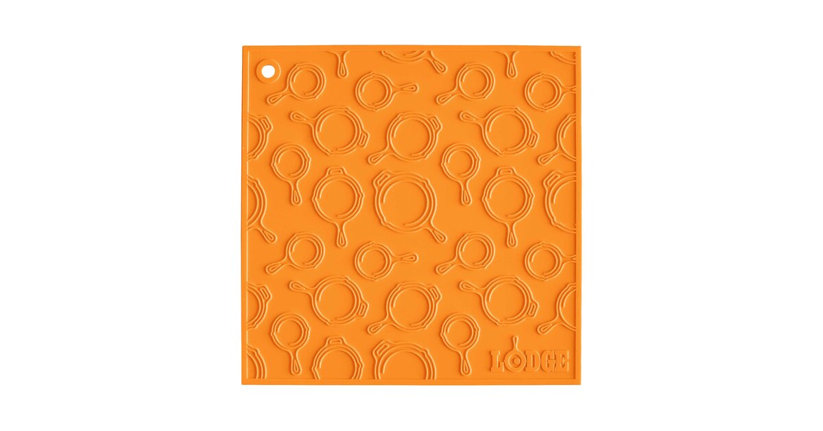 Lodge AS7SKT61 7 x 7 Orange Skillet Pattern Silicone Trivet / Pot Holder